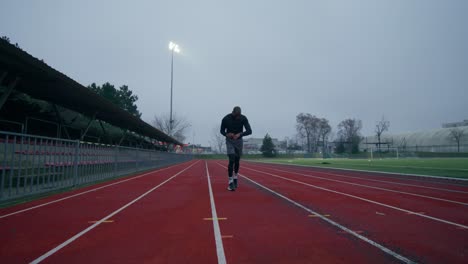 man running on a track