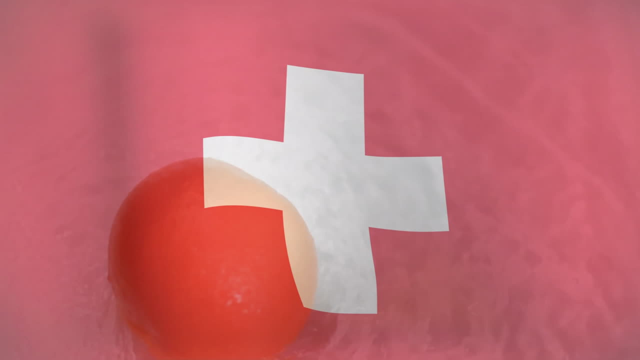 Red sphere with white cross symbol on pink background resembling animation