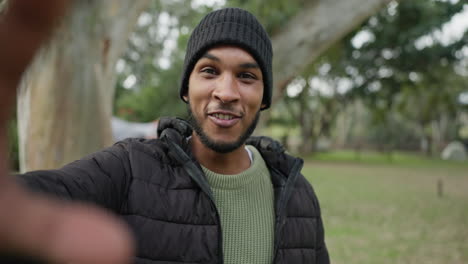 man, talking and camping with video call