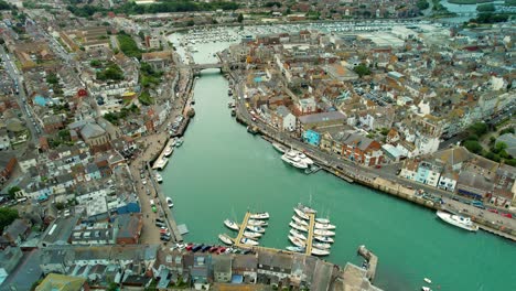 Aerial-View-Of-The-Old-Harbour-At-Weymouth,-Dorset-In-England---drone-shot