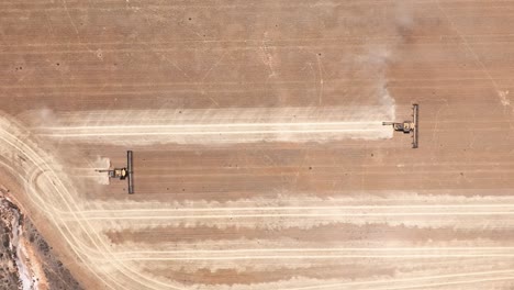 This-footage-captures-the-synergy-of-modern-agricultural-technology,-showcasing-the-essential-role-of-header-fronts-in-the-wheat-harvesting-process