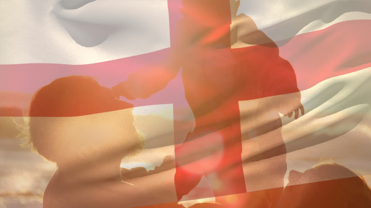 해변에서 아이와 함께 백인 부모 위에 영국  ⁇ 발의 애니메이션