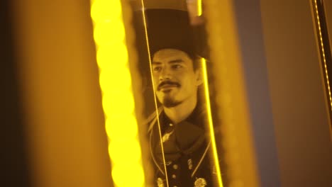 camera going from left to right footage of an man getting dressed putting mexican hat