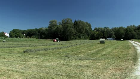 Hay-harvest-near-Ingolstadt,-Bavaria,-Germany