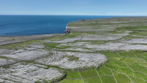 flying inland of dun angus over the barren rocks of inis mor to the fort and the sheer cliffs to the atlantic sea aran islands west of ireland