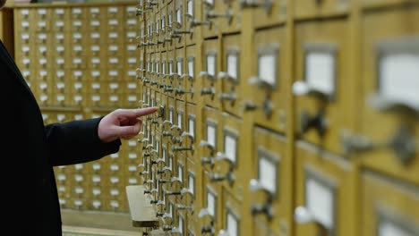 man turning combination lock