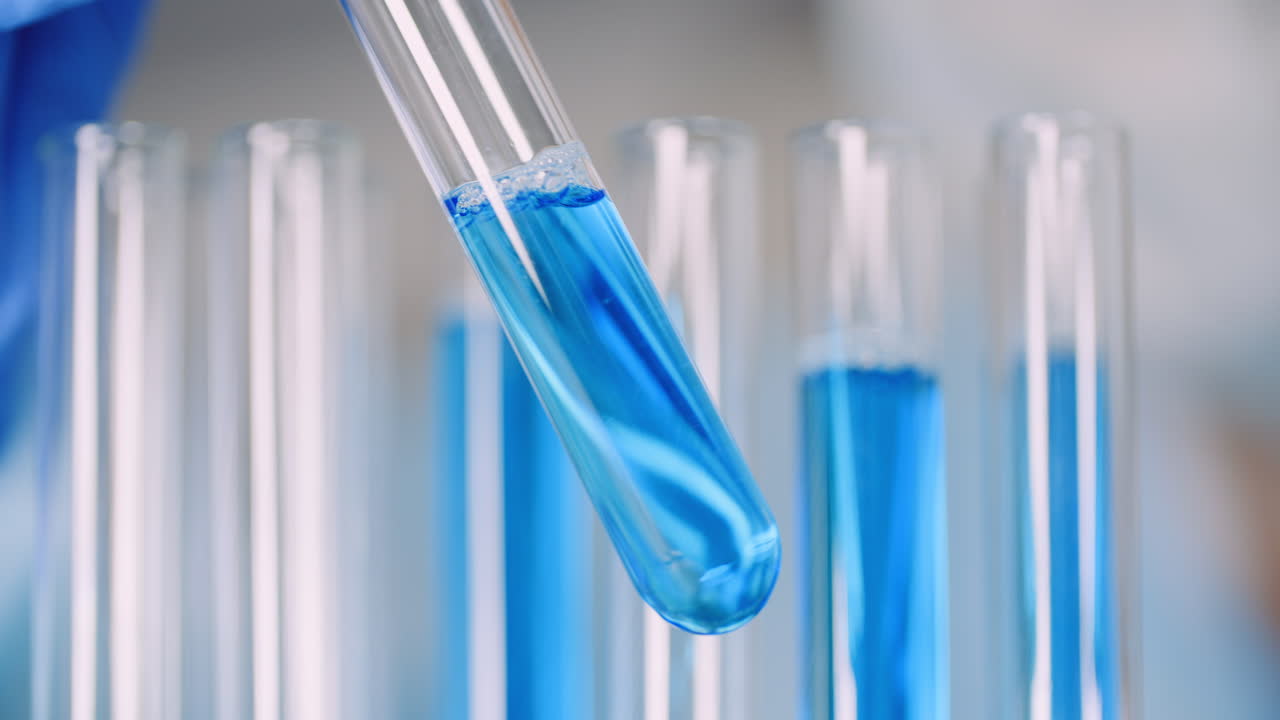 Working In Laboratory Scientist Using Holding Test Tubes In Hand 1