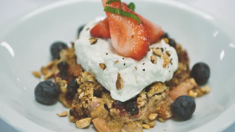 sweet dish with berry cookies and cottage cheese