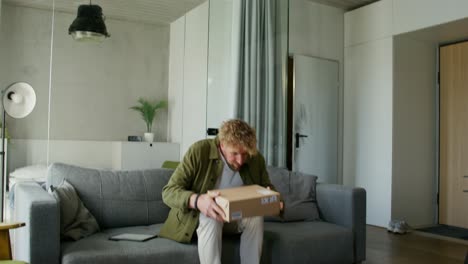 man receiving delivery at home