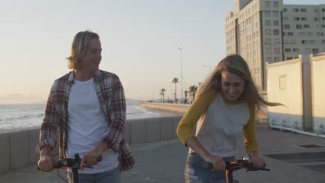 caucasian couple enjoying their time seaside