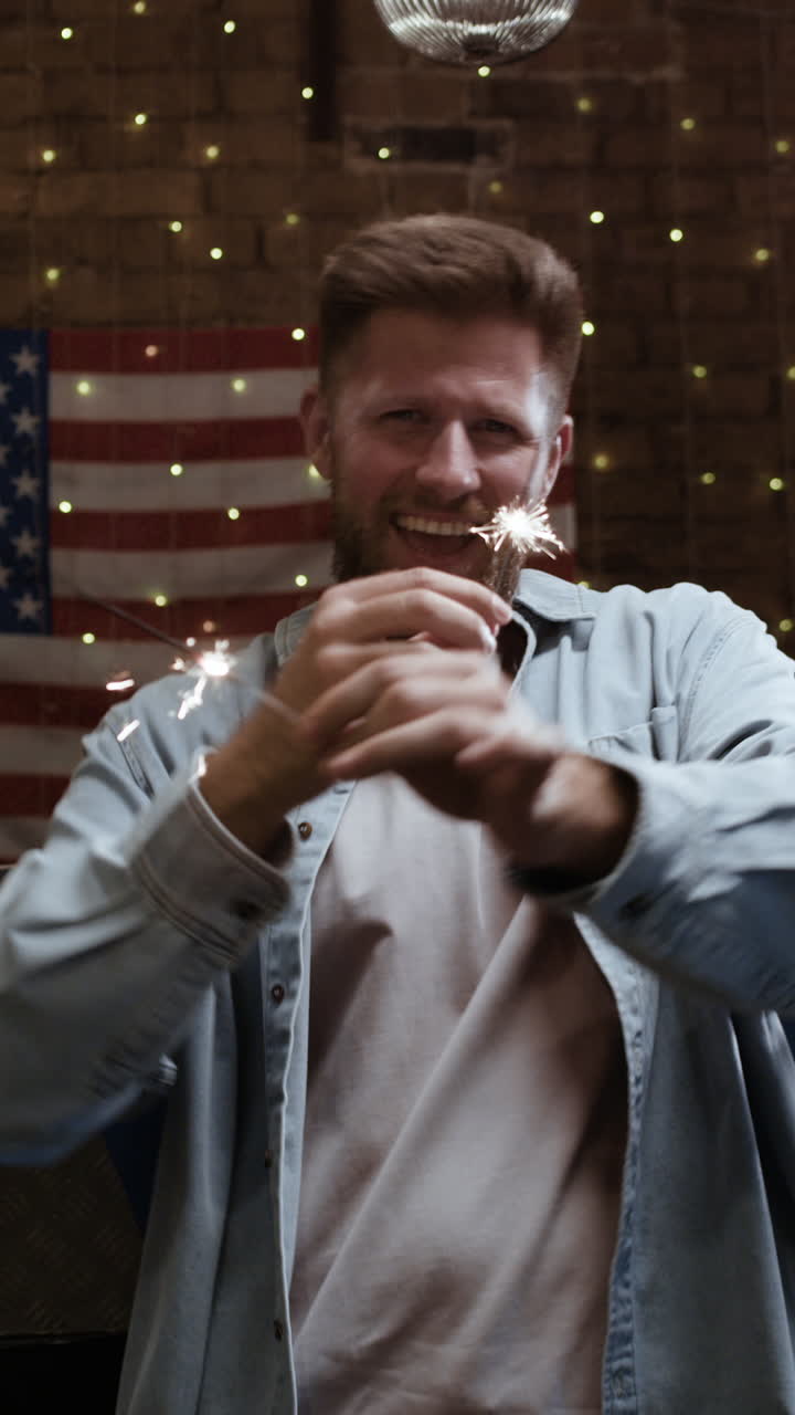 Man Celebrating with Sparklers