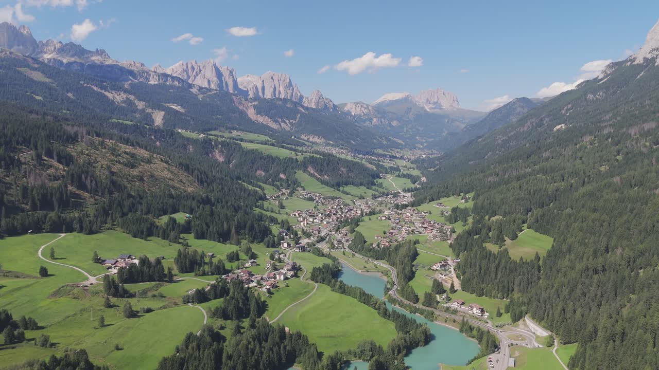 Amazing aerial view of Val di Fassa beautiful valley and alpine environment, Moena, Dolomites, Trentino, Italy