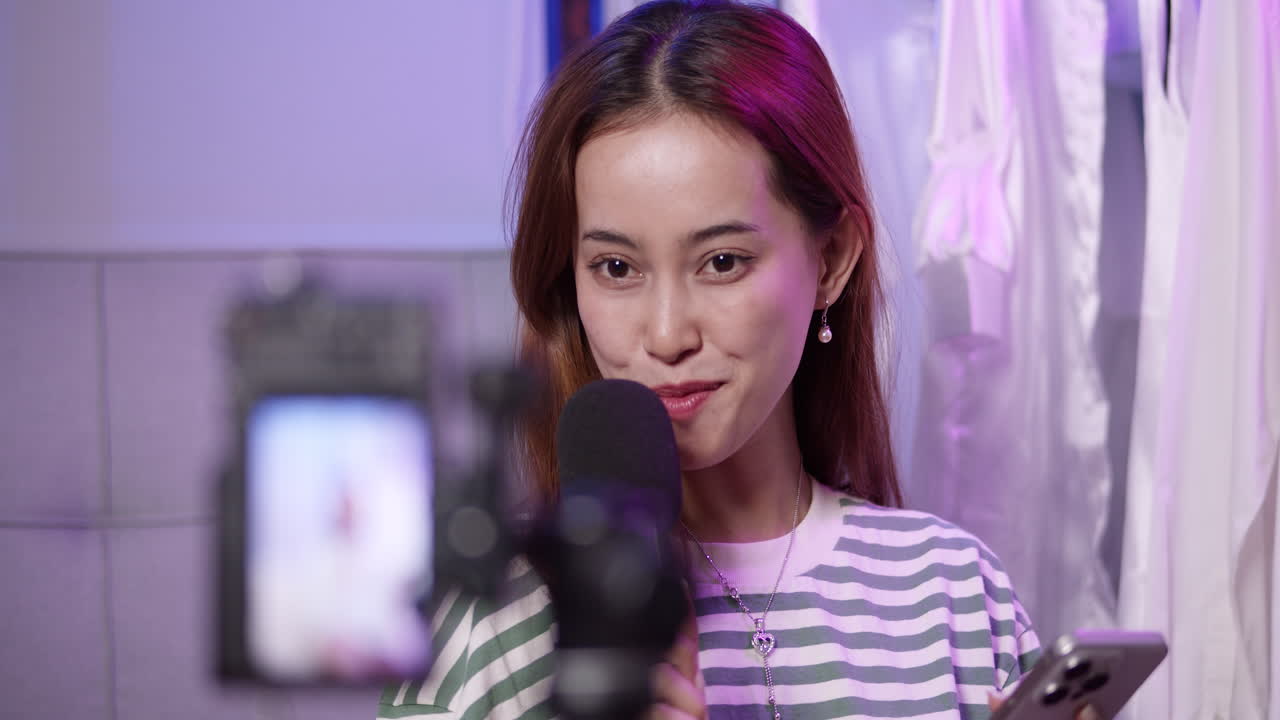 A content creator passionately engages with her audience during a vibrant live streaming session.