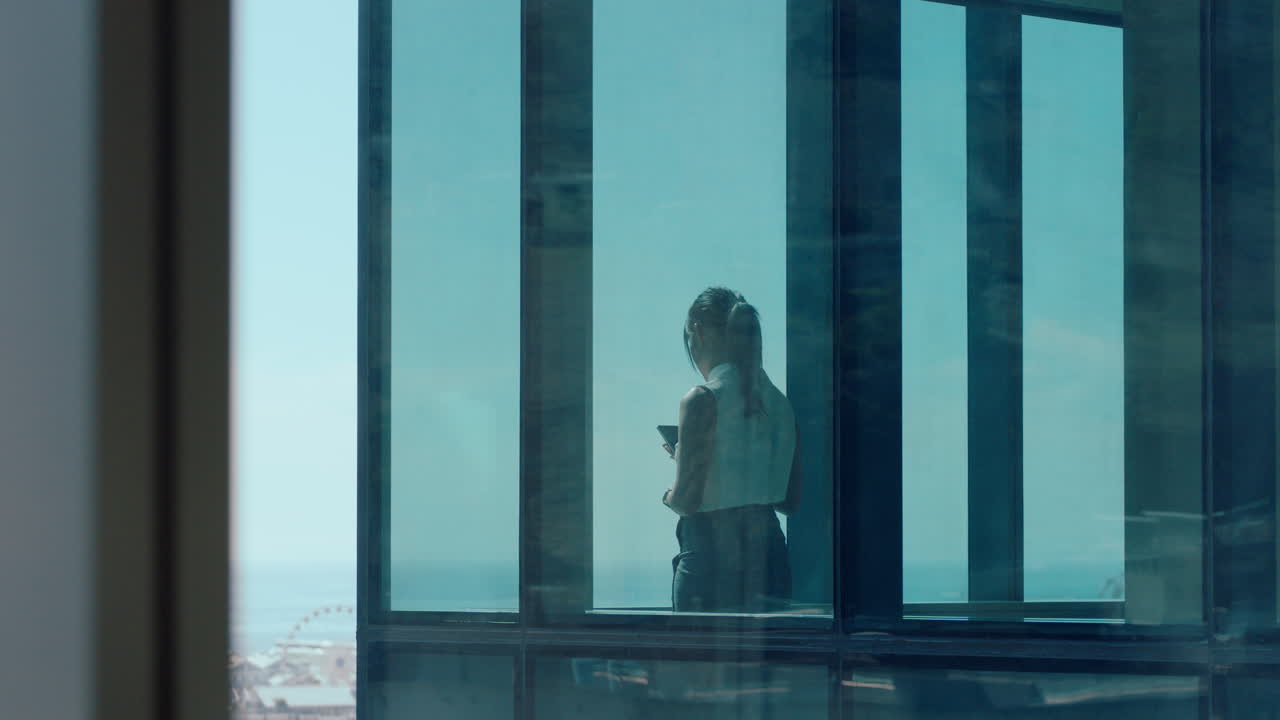 successful asian business woman looking out window proud ceo planning ahead thinking of ideas for future investment strategy corporate manager enjoying leadership career in office