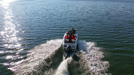 boat sailing on the river. aerial drone view of motor boat sailing on river