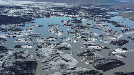 glacial lake and icebergs aerial view