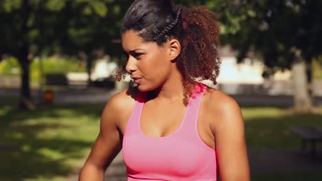 Cute-woman-jogging-in-park