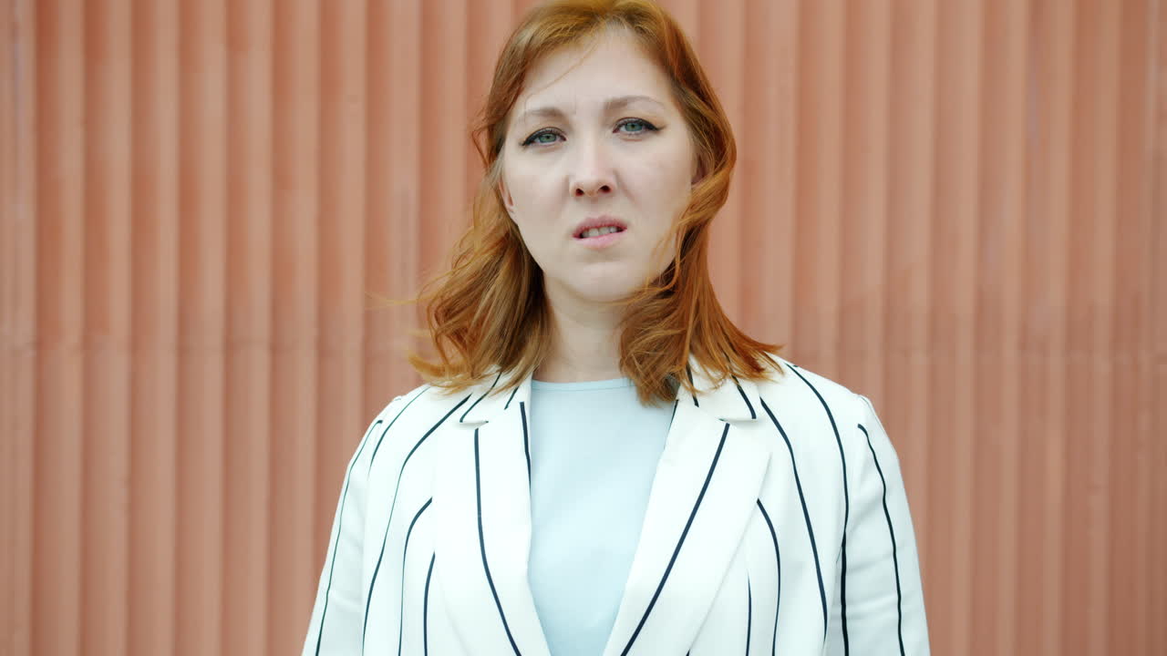 Woman in a White Striped Jacket