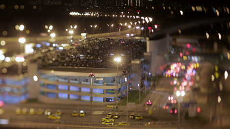 Timelapse-night-shot-of-car-traffic-near-parking-lot