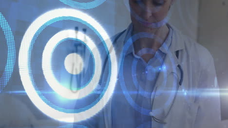 female doctor using stethoscope interacting with digital interface showing glowing blue circles