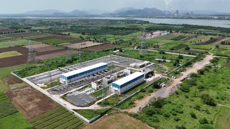 aerial view of a power substation in a rural landscape