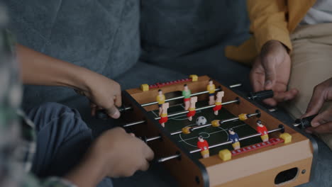 Family Playing Table Football