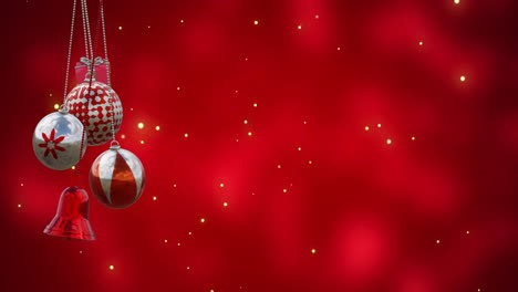animation of christmas baubles over light spots on red background