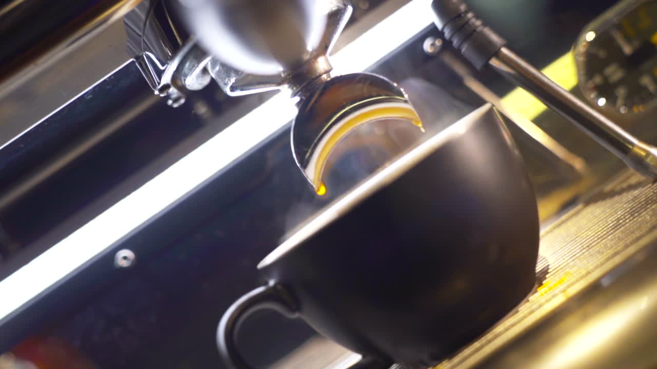 Coffee machine on a wooden table Slow motion.