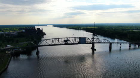 flight up and told over an old bridge and river