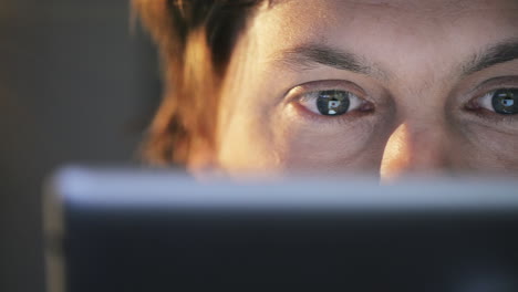 man using tablet computer touchscreen close-up touching