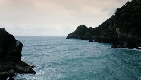 Cliffs-and-Rough-Waves-on-Stunning-Taiwan-East-Coast-Atlantic-Ocean-during-Sunset-Dusk