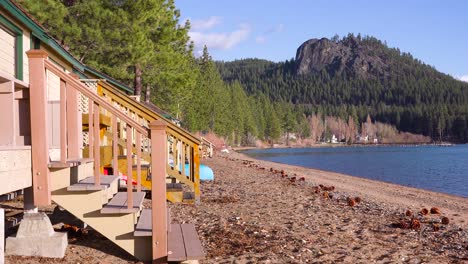 summer cabins and cabanas line the shores of a resort at lake tahoe nevada