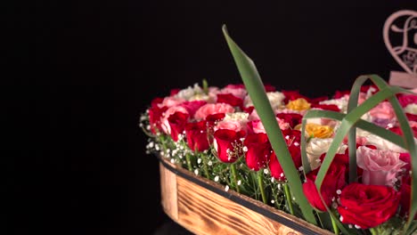 Roses-Arrangement-wood-hearth-and-love-you-sign-slider-shot-black-background