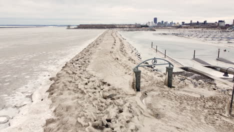 breakwater covered in ice after powerful winter storm in new york city