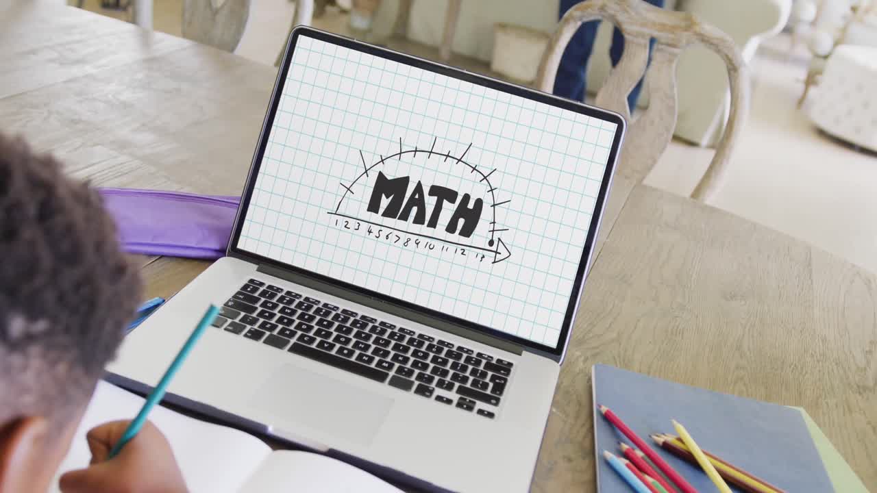 Composition of african american boy on laptop online learning maths