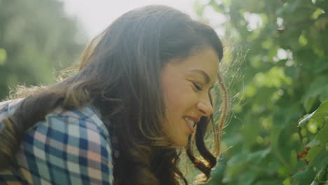 woman enjoying grape harvest