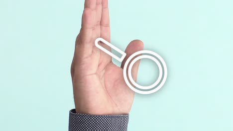 hand of a person on which the animation of a search magnifying glass appears