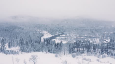 Foggy-Winter-Landscape---Drone-Flying-4K---Mountains---Trees,-rivers,-snowy---Cinematic-river