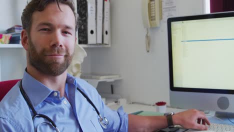 Doctor-smiling-at-camera-in-a-retirement-home