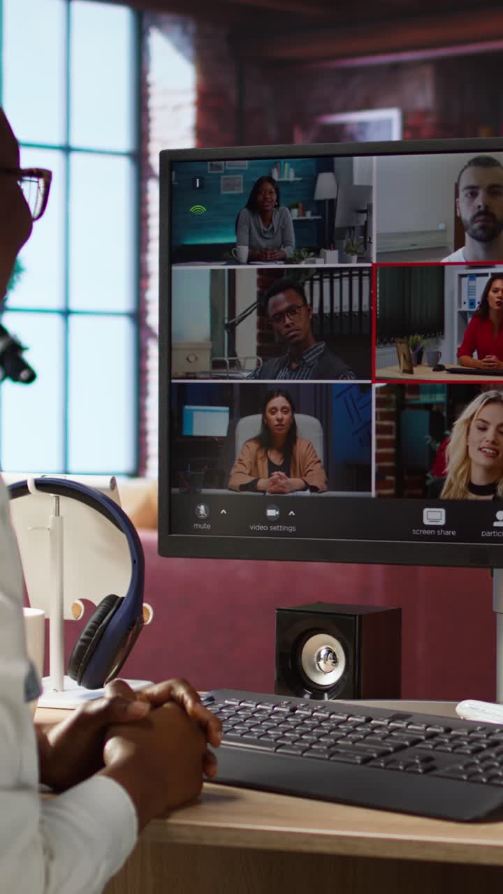 Vertical video Remote employee in home office saluting colleagues during online videocall