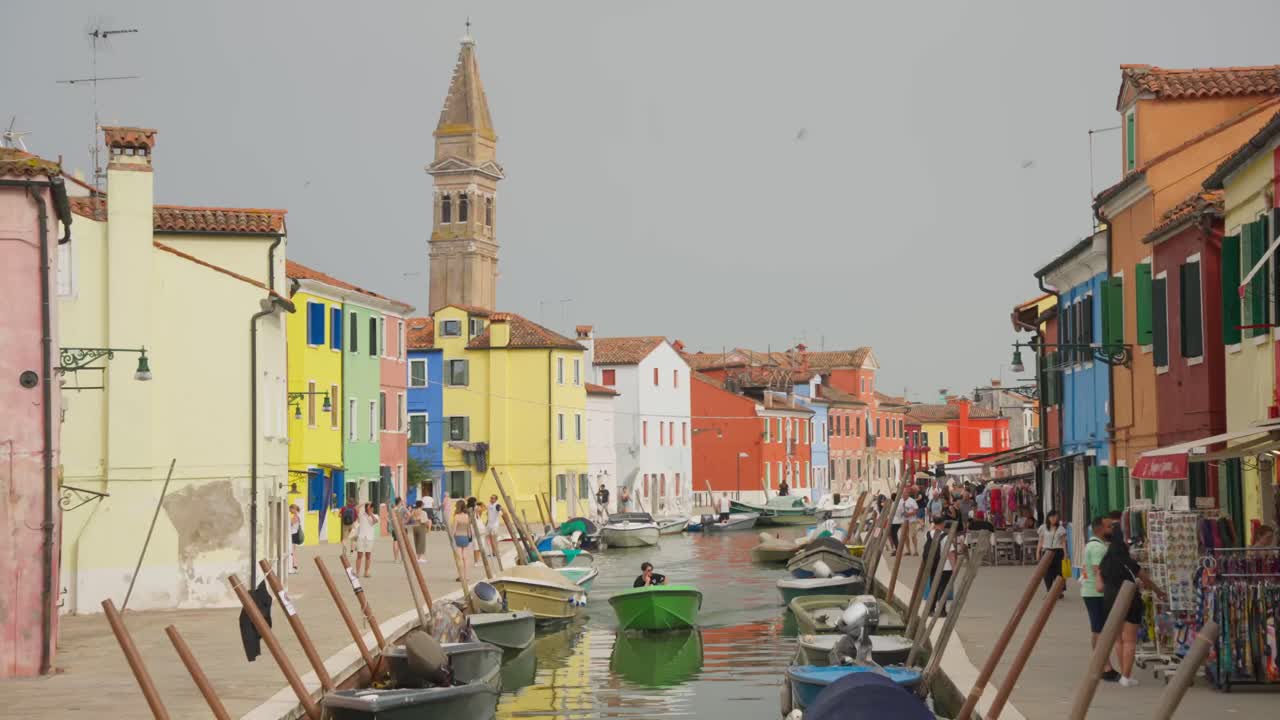 Village With Colorful Building Houses And Canal Boats In Burano Island In Venice, Italy. Static Shot