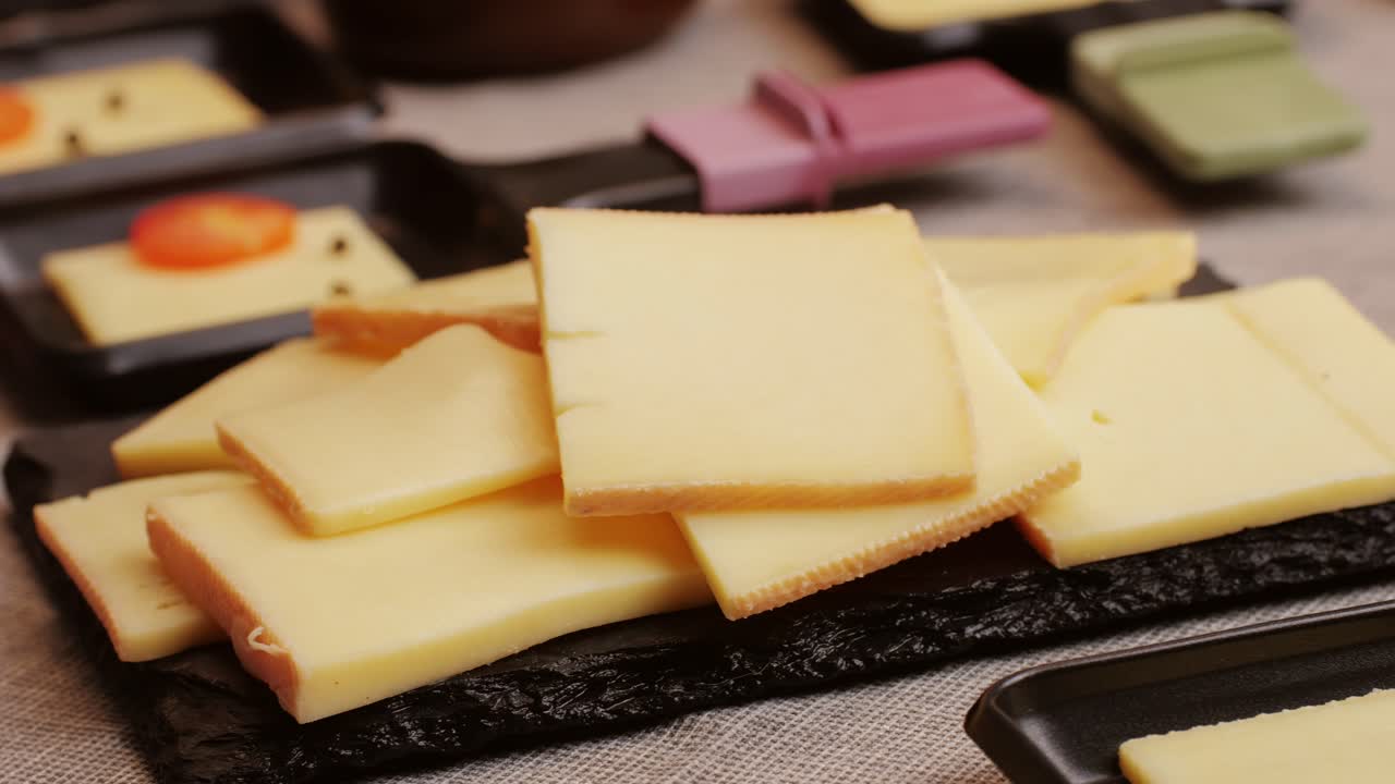 Italian or Spanish restaurant with traditional tapas food, Spanish cuisine, delicious tapas and cheese plate, bruschetta with cheese, olives dry tomatoes and tasty sandwich bar appetizer, buffet