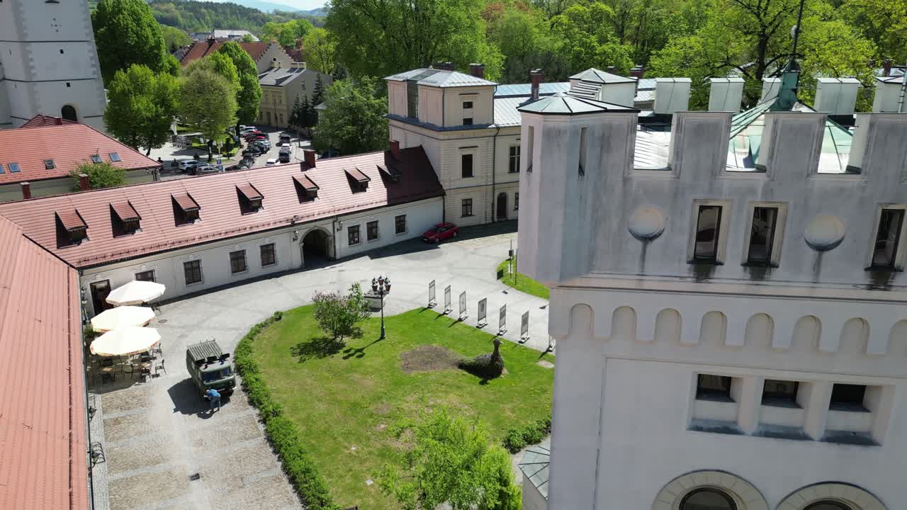 Old castle courtyard and tower in Zywiec - aerial 4k