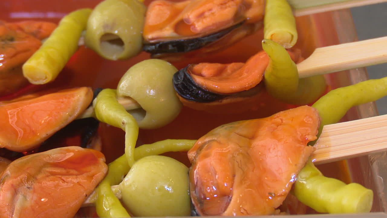 Appetizer Skewers with Mussels, Olives, and Peppers