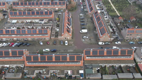 aerial dolly of solar panels on suburban houses