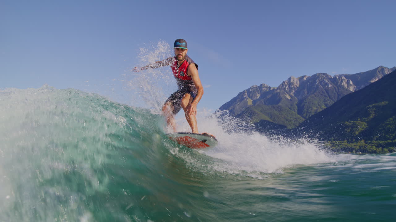 Sunset watersports on Lake Léman with friends: wakesurfing, foiling, and alpine views. Vibrant action meets Swiss serenity—perfect for outdoor, lifestyle, or travel projects.