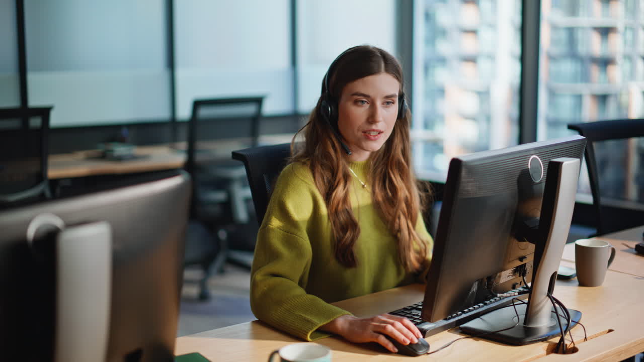 Helpful assistant consult customer in office remotely. Joyful agent speaking