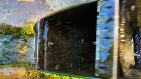 small spinning water wheel, top down, closeup