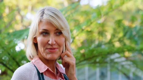 Mature-woman-talking-on-mobile-phone