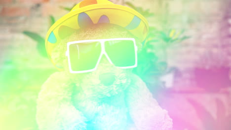 teddy bear with party hat and sunglasses